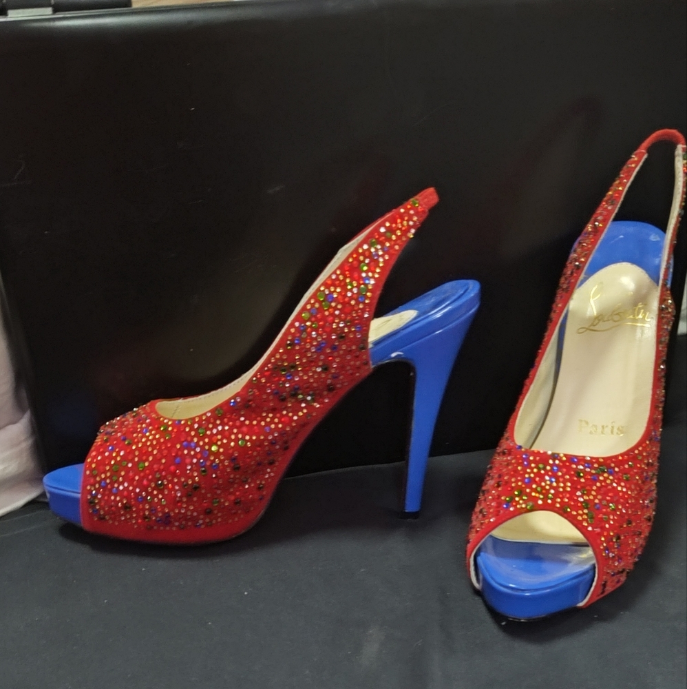 Christian Louboutins red bottom heels with multicolored gems 41
